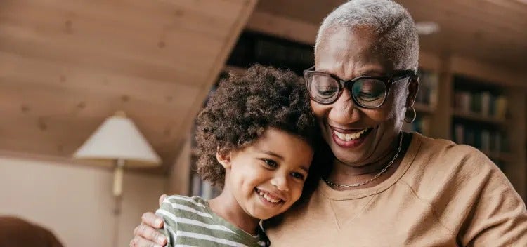 Image of an older woman hugging a child (not real patients) mobile
